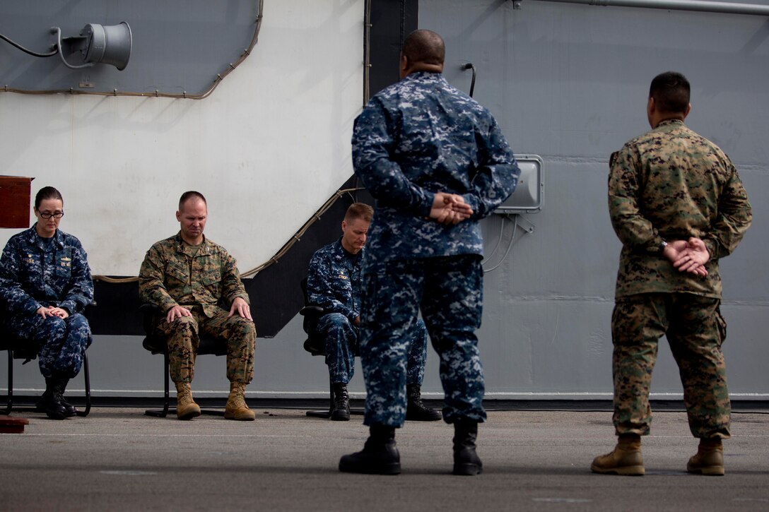 Leadership of the 31st Marine Expeditionary Unit, Amphibious Squadron 11 and USS Bonhomme Richard (LHD-6) reflect during a during a ceremony to commemorate the victims of the March 2011 Tohoku earthquake and tsunami on the flight deck of the USS Bonhomme Richard (LHD-6), Mar. 11. During Operation Tomodachi, the 31st MEU and PHIBRON-11 distributed 164,000 pounds of food, thousands of gallons of water and other relief supplies to Kesennuma, Oshima Island and other areas throughout the Honshu region. Colonel John Merna, commanding officer of the 31st MEU and a native of Prince George’s County, Md., said, “General Mattis once said that when it comes to U.S. Marines, there is no better friend, no worse enemy. The friendships made with the people of Oshima Island, for example, continue to this day. The history of the 31st MEU - PHIBRON-11 team will be forever linked to the people of Oshima Island.” The 31st MEU is currently conducting amphibious integration training alongside PHIBRON-11 while deployed for its regularly-scheduled Spring Patrol. The 31st MEU is the Marine Corps’ force of choice for the Asia-Pacific region and is the only continuously forward-deployed MEU.