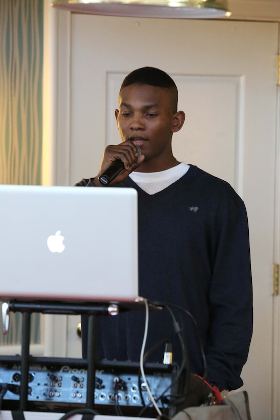 Pfc. Omri Blair sings a song during a karaoke event at the Clubs at Quantico on March 5, 2014. The Clubs are hosting a weekly karaoke event with hundreds of songs for participants to choose from. 