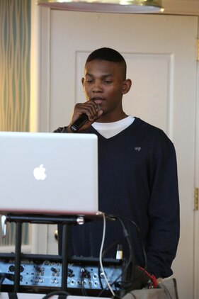 Pfc. Omri Blair sings a song during a karaoke event at the Clubs at Quantico on March 5, 2014. The Clubs are hosting a weekly karaoke event with hundreds of songs for participants to choose from. 