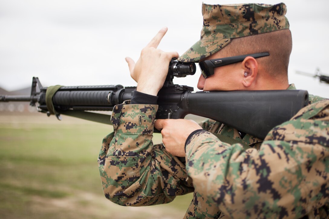 U.S. Marine Corps Sgt.Tyler Webb, recruiter with RSS Fremont, RS San Francisco, 12th Marine Corps District, fires a M16 A-4 service rifle at Wilcox Range aboard Camp Pendleton, Calif., March 4, 2014. Webb was competing in the 2014 Western Division Matches. (U.S. Marine Corps photo by Cpl Catie Masesy, 12th Marine Corps District/Released)