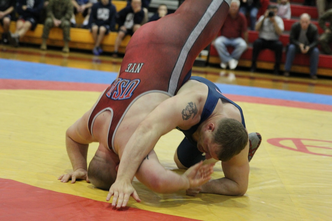 Greco-Roman heavy weight battle between Marine SSgt David Arednt and Army PFC Eric Nye.  Arendt won the Greco-Roman gold defeating Nye 5-0.  