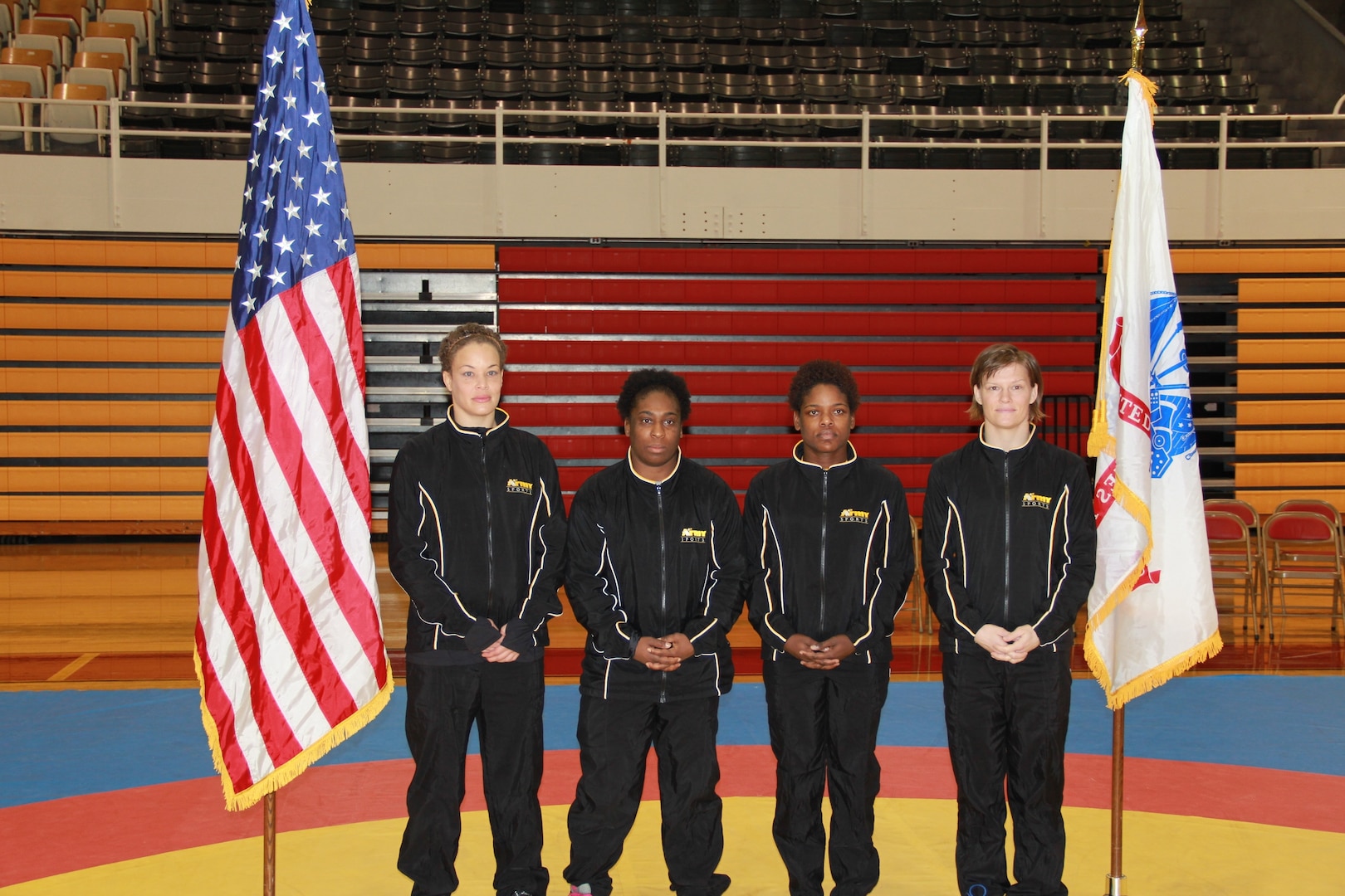 All-Army Wrestlers from left to right: CPT Leigh Provisor, SGT Randi Miller, SGT Othello Feroleto, and SGT Sally Roberts.  