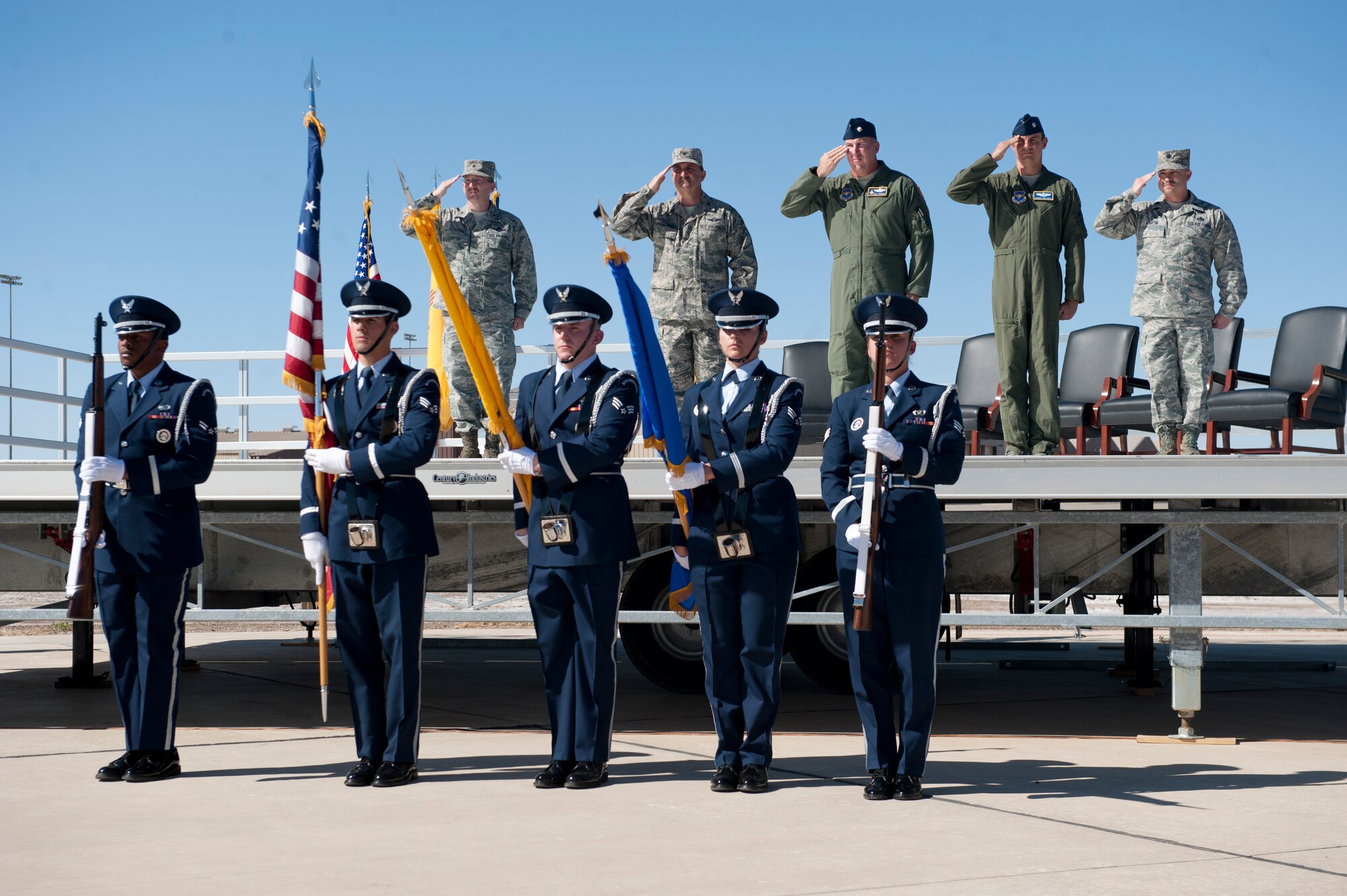 Members of the Steel Talons Honor Guard presented the colors during the 54th Fighter Group activation ceremony at Holloman Air Force Base, N.M., March 11. The 54th Fighter Group, a tenant unit at Holloman, is a detachment of the 56th Fighter Wing at Luke Air Force Base, Ariz., and will ultimately operate two F-16 Fighting Falcon aircraft training squadrons. The 54th Fighter Group plus three squadrons were activated at the ceremony: the 311th Fighter Squadron, the 54th Operations Support Squadron and the 54th Aircraft Maintenance Squadron. (U.S. Air Force photo by Senior Airman Daniel E. Liddicoet/Released)