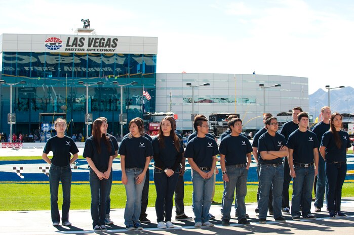 Air Force recruits wait to take their oath of enlistment during the opening ceremonies at the Kobalt 400 NASCAR race March 9, 2014 at Las Vegas Motor Speedway, Las Vegas, Nev.  The recruits are preparing to enter the active duty Air Force via the Delayed Entry Program. (U.S. Air Force photo by Airman First Class Joshua Kleinholz)