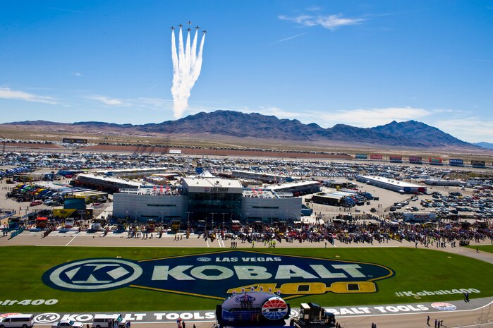 U.S. Air Force Air Demonstration Squadron, Thunderbirds, perform a fly over during the opening ceremony of the Kobalt 400 NASCAR race March 9, 2014, at Las Vegas Motor Speedway in Las Vegas. This was the Thunderbirds second fly over since the start of this year. (U.S. Air Force photo by Senior Airman Christopher Tam)
