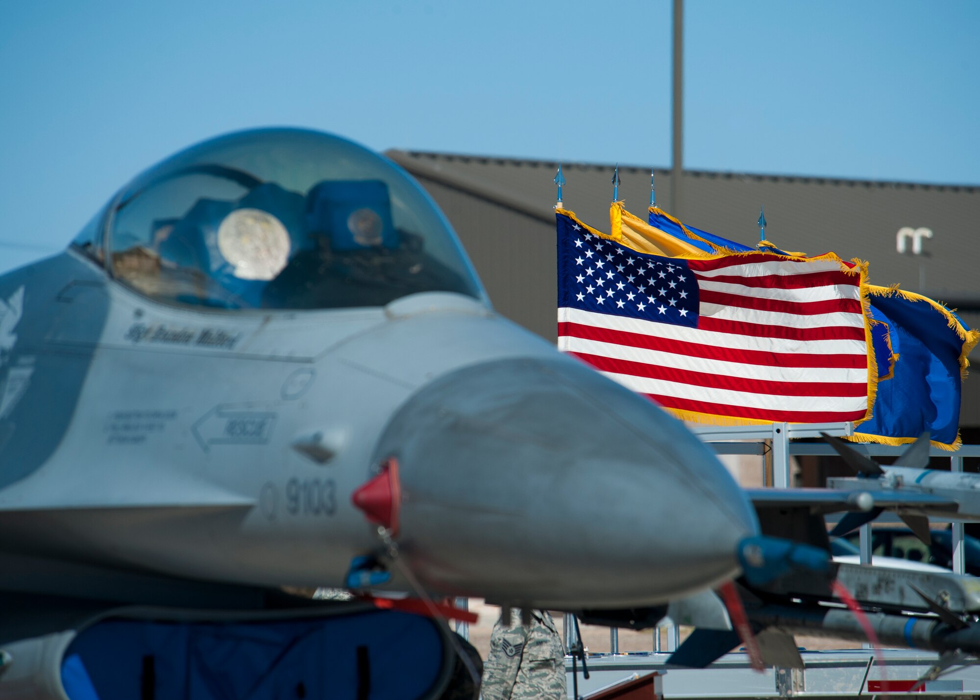 An F-16 Falcon is displayed during the 54th Fighter Group activation at Holloman Air Force Base, N.M., March 11. The 54th Fighter Group, a tenant unit at Holloman, is a detachment the 56th Fighter Wing at Luke Air Force Base, Ariz., and will ultimately operate two F-16 Fighting Falcon aircraft training squadrons. The 54th Fighter Group plus three squadrons were activated at the ceremony: the 311th Fighter Squadron, the 54th Operations Support Squadron and the 54th Aircraft Maintenance Squadron. (U.S. Air Force photo by Airman 1st Class Aaron Montoya / Released)