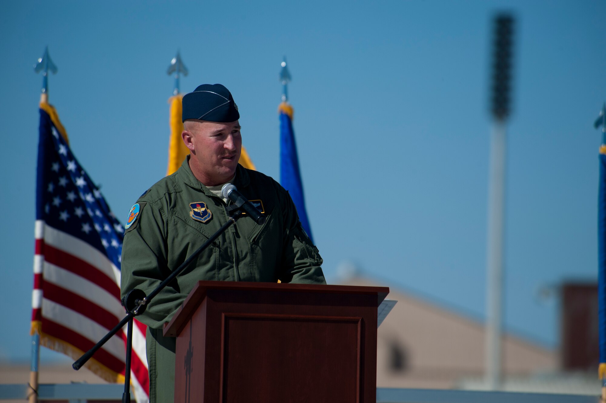 Lieutenant Col. Scott Fredrick, 311th Fighter Squadron commander, delivers a speech during the 54th Fighter Group activation at Holloman Air Force Base, N.M., March 11. The 54th Fighter Group, a tenant unit at Holloman, is a detachment the 56th Fighter Wing at Luke Air Force Base, Ariz., and will ultimately operate two F-16 Fighting Falcon aircraft training squadrons. The 54th Fighter Group plus three squadrons were activated at the ceremony: the 311th Fighter Squadron, the 54th Operations Support Squadron and the 54th Aircraft Maintenance Squadron. (U.S. Air Force photo by Airman 1st Class Aaron Montoya / Released)