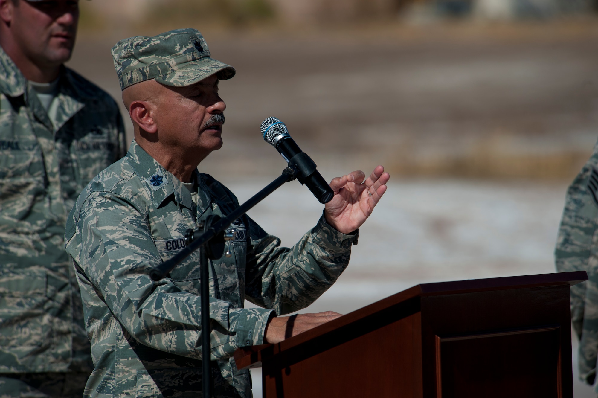 Lieutenant Col. Hector Coloncolon, 49th Wing chaplain, delivers the invocation during the 54th Fighter Group activation at Holloman Air Force Base, N.M., March 11. The 54th Fighter Group, a tenant unit at Holloman, is a detachment the 56th Fighter Wing at Luke Air Force Base, Ariz., and will ultimately operate two F-16 Fighting Falcon aircraft training squadrons. The 54th Fighter Group plus three squadrons were activated at the ceremony: the 311th Fighter Squadron, the 54th Operations Support Squadron and the 54th Aircraft Maintenance Squadron. (U.S. Air Force photo by Airman 1st Class Aaron Montoya / Released)