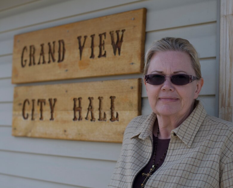 Tammy Payne poses for a photo in front of City Hall in Grand View, Idaho, March 11, 2014. Payne has been a resident of the city for more than five years and says she loves everything Mountain Home Air Force Base does. (U.S. Air Force photo by Airman 1st Class Brittany A. Chase/Released)