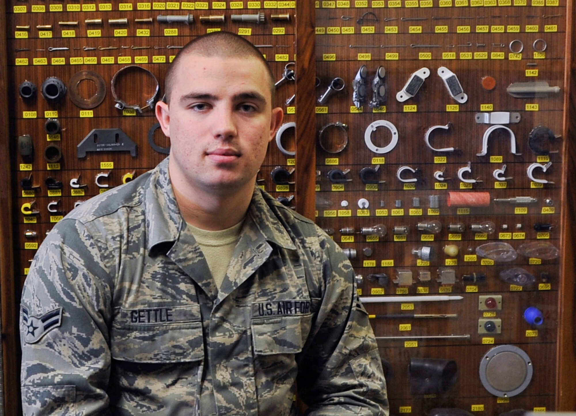 U.S. Air Force Airman 1st Class Brandon L. Gettle, 14th Aircraft Maintenance Unit mission support, is the Wild Weasel of the Week for Mar. 10, 2014 at Misawa Air Base, Japan. Gettle maintains command of the aircraft parts store from his desk, where he has access to all available supplies. (U.S. Air Force photo/Airman 1st Class Patrick S. Ciccarone)