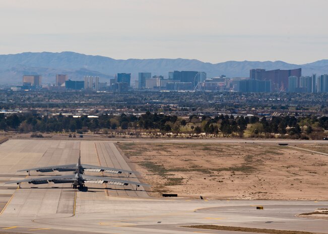 Two U.S. Air Force B-52 Stratofortresses assigned to the 96th Bomb Squadron from Barksdale Air Force Base, La. taxi out to the runway during Red Flag 14-2 March 7, 2014, at Nellis AFB, Nev. Red Flag provides realistic combat scenarios in a training environment to improve operational readiness in preparation for real world operations. (U.S. Air Force photo by Airman 1st Class Timothy Young)
