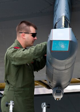 U.S. Air Force Capt. Timothy Humpal, 343rd Bomb Squadron radar navigator, performs pre-flight checks on a B-52 Stratofortress assigned to the 96th Bomb Squadron from Barksdale Air Force Base, La. during Red Flag 14-2 March 6, 2014, Nellis AFB, Nev. Red Flag provides realistic air combat missions in a training environment. The exercise training missions ensure air and ground crews are better prepared for future real-world operations. (U.S. Air Force photo by Airman 1st Class Thomas Spangler)

