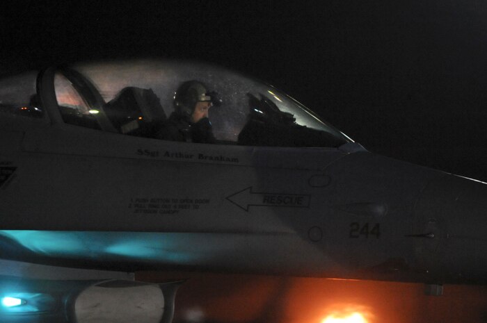 A Belgian air force pilot taxis to the runway during night operations March 10, 2014 at Nellis Air Force Base, Nev. The Belgian air force, along with five other coalition nations, came to Nellis AFB to participate in Red Flag 14-2.  (Air Force photo/Staff Sgt. Chuck Broadway)
