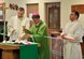 Father Arnis Suleimanovs, Archbishop Timothy Broglio and Father Michael Czyzewski begin the communion ceremony during Mass at the Airmen Ministry Center as part of the “Come Be With Us” tour Feb. 25 The tour brings civilian priests to both Nellis and Creech Air Force Base to help recruit chaplains. (U.S. Air Force photos by Airman 1st Class C.C./released)