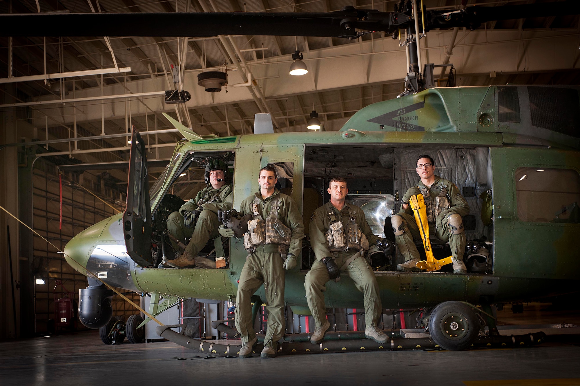 Captain Matthew R. Sutliff, 1st Lt. Kyle B. Nelson, Tech. Sgt. Jason L. Fifield and Staff Sgt. Michael R. Wright are the 54th Helicopter Squadron crew members responsible for the successful search and rescue early this morning of two people in Savage, Mont.  At around midnight the 54 HS received a phone call from the Air Force Rescue Coordination Center requesting an aircraft with hoist capability. In Eastern Montana, an ice flow had caused the river to overrun its banks, trapping the two individuals in the bed of their truck.  Rescue workers were on the scene, but unable to get to the stranded individuals due to large chunks of ice in the water. Both individuals were hoisted from the bed of their truck and carried to safety.  (U.S. Air Force image/Senior Airman Stephanie Sauberan)