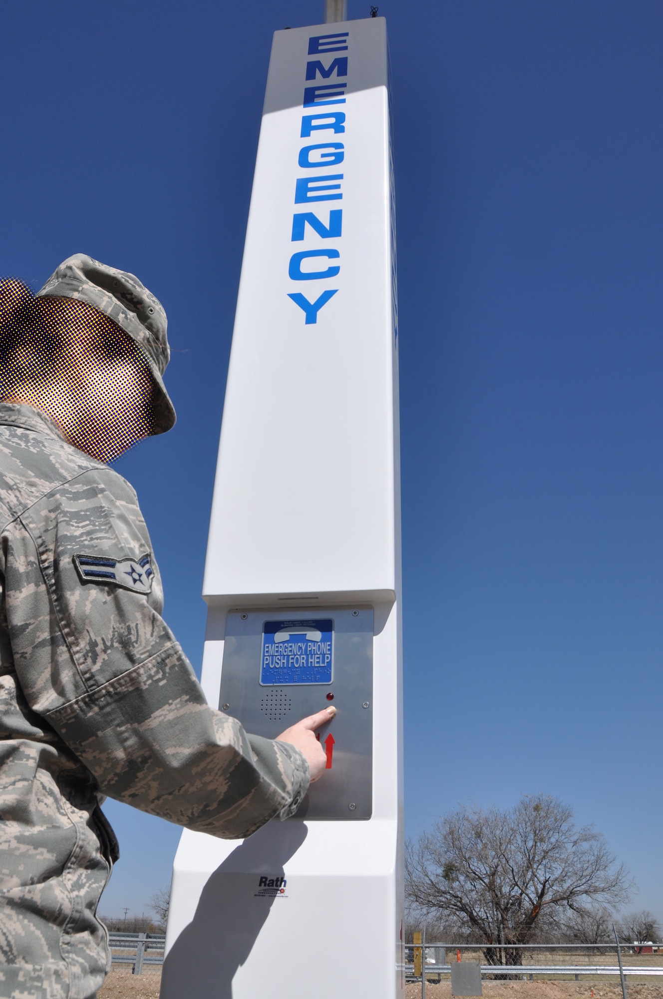 GOODFELLOW AIR FORCE BASE, Texas -- Four emergency call boxes now stand along the Perimeter Road here. These solar-powered, stand-alone emergency call boxes enhance the safety and security of personnel completing physical fitness activities by immediately directing the phone call to the fire department and security forces law enforcement desk on base. During dark hours, the light on the top will provide additional lighting in the area.  (U.S. Air Force photo illustration/ Airman 1st Class Breonna Veal)