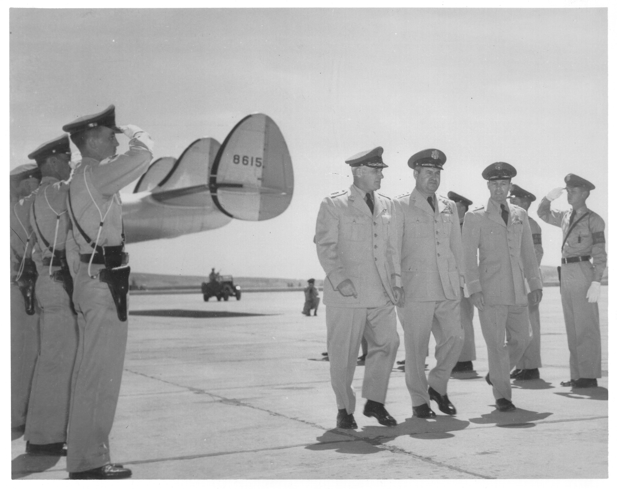 Gen. Nathan F. Twining, Air Force Vice Chief of Staff, Lt. Gen Gen. Curtis E. LeMay and Brig. Gen. C. J. Bondley Jr., step off a plane at Spokane Air Force Base, Wash., to attend the dedication ceremony July 20, 1951. Spokane Air Force Base was officially named Fairchild during the base dedication ceremony. The base was named for Gen. Muir S. Fairchild, former Vice Chief of Staff of the Air Force and a Bellingham, Wash., native. (Historical photo)