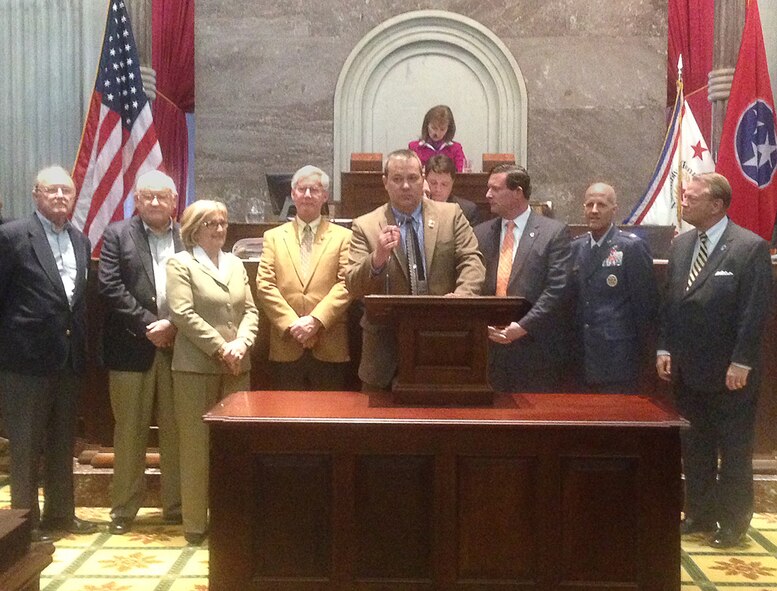 Tennessee State Representative Judd Matheny (center) and Senator Janice Bowling presented a House Joint Resolution 718 to honor and commemorate AEDC, proclaiming March 12 as AEDC Day in Tennessee. Shown standing with Matheny is (l-r) Industrial Board of Coffee County Executive Director Ted Hackney, Industrial Board of Coffee County Chairman Bill Comer, Congressman Diane Black, Rep. David Alexander, ACC President Ben Craig, AEDC Test Support Division Director Col. James Krajewski and Air Force Chief of Staff Civic Leader Walt Wood. (Photo by provided)