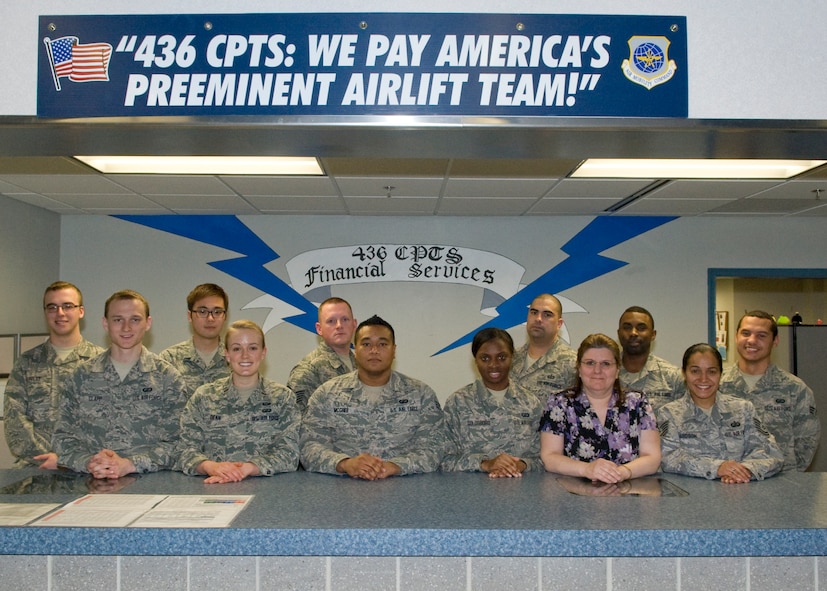 Airmen from the 436th Comptroller Squadron financial services flight pose for a group photo March 11, 2014, at Dover Air Force Base, Del. The financial services flight won the Air Mobility Command Financial Services Flight of the Year. (U.S. Air Force photo/Airman 1st Class Zachary Cacicia