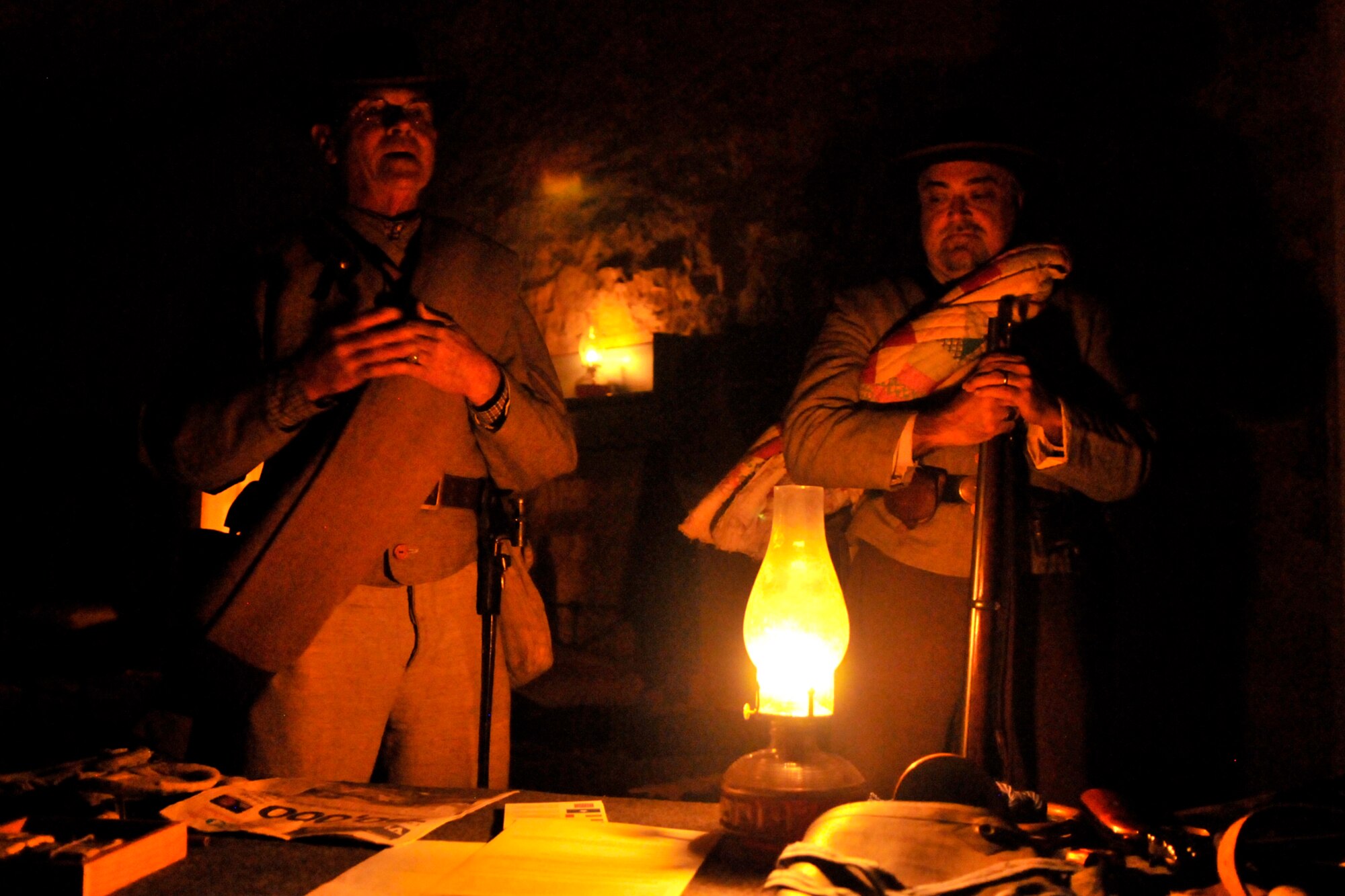 SAN ANGELO, Texas – Fort Concho re-enactors give a presentation during the Overnight Excursion at Fort Concho Feb. 28. The re-enactors discussed the life of military members at Fort Concho in the late 1800s. They also presented the different kinds of weapons and equipment used in that time period. (U.S. Air Force photo/ Airman 1st Class Devin Boyer)
