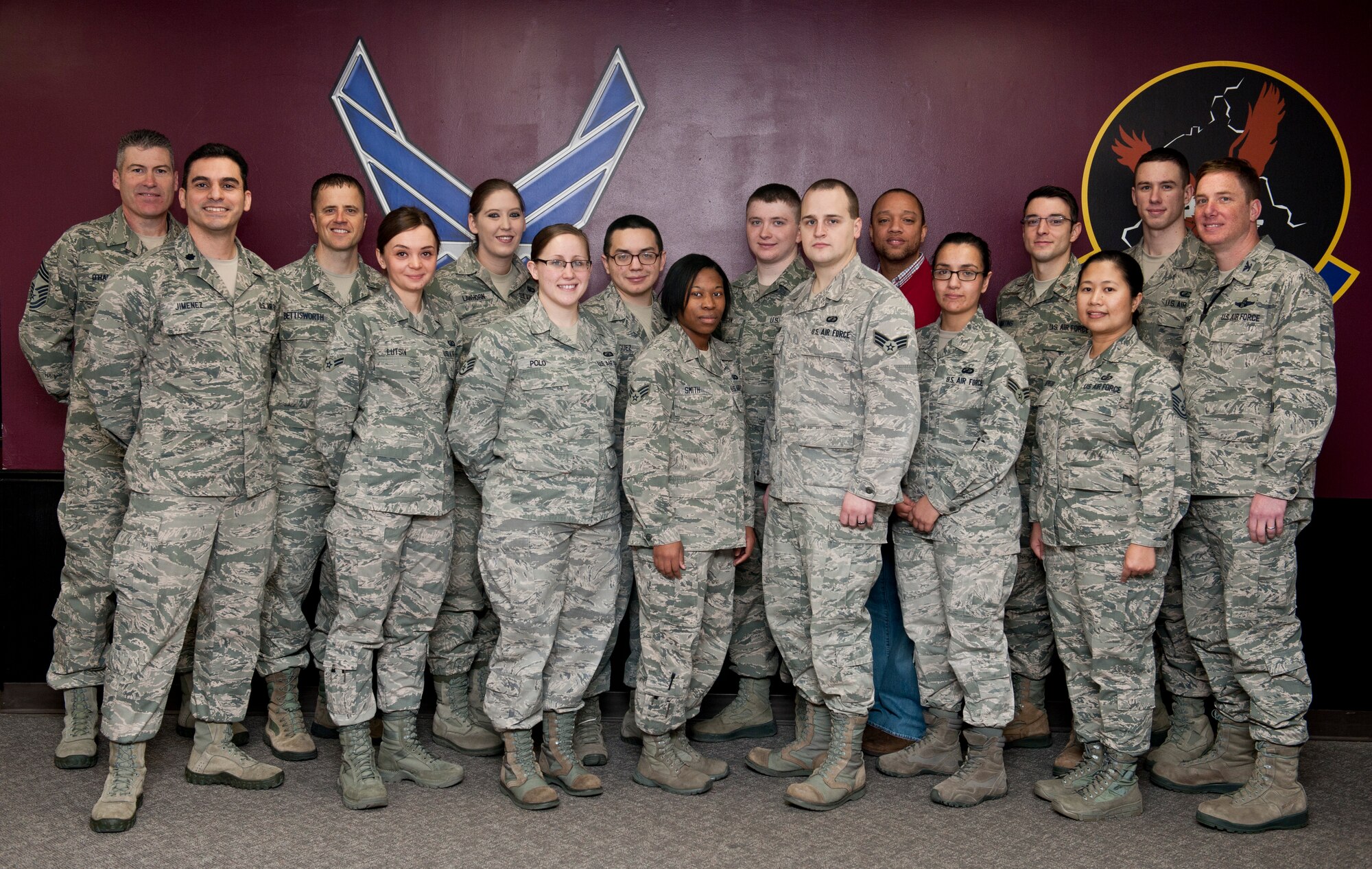 Airmen from the 5th Comptroller Squadron finance office pose for a photo at Minot Air Force Base, N.D., Feb. 21, 2014. The finance office was awarded the Air Force Financial Services Office of the Year. (U.S. Air Force photo by Airman 1st Class Sahara L. Fales)