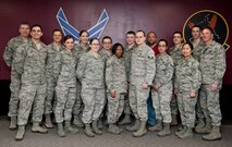 Airmen from the 5th Comptroller Squadron finance office pose for a photo at Minot Air Force Base, N.D., Feb. 21, 2014. The finance office was awarded the Air Force Financial Services Office of the Year. (U.S. Air Force photo by Airman 1st Class Sahara L. Fales)
