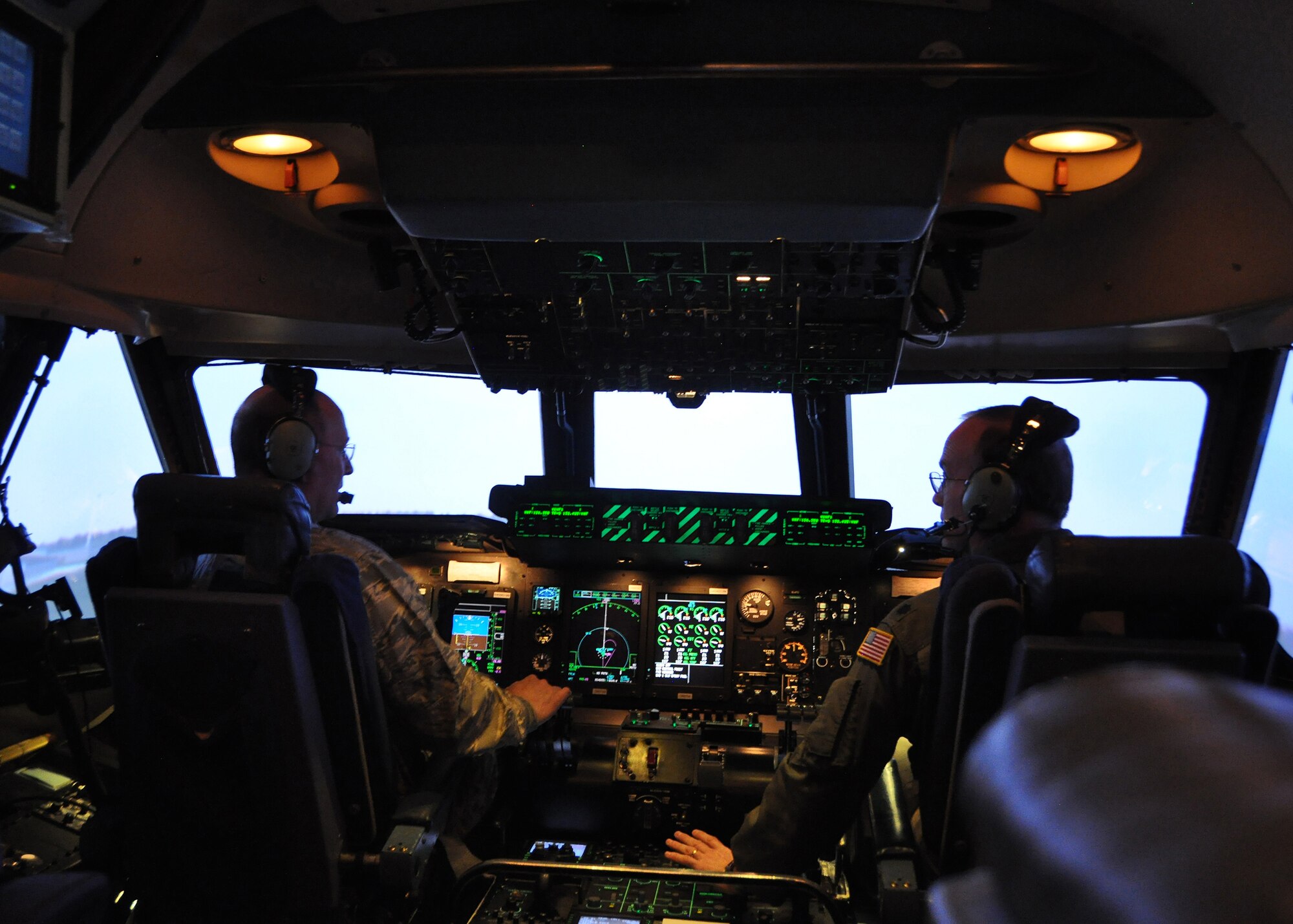 Lt. Col. Donald Whitley (right), 512th Airlift Wing, provides an orientation of a C-5M simulator to Lt. Gen. James F. Jackson (left), Air Force Reserve Command commander, during his visit to Dover Air Force Base, Del., March 1, 2014. This was the first visit to the Liberty Wing for Jackson and Chief Master Sgt. Cameron B. Kirksey, AFRC command chief. (U.S. Air Force photo/Senior Airman Erika Brooke)