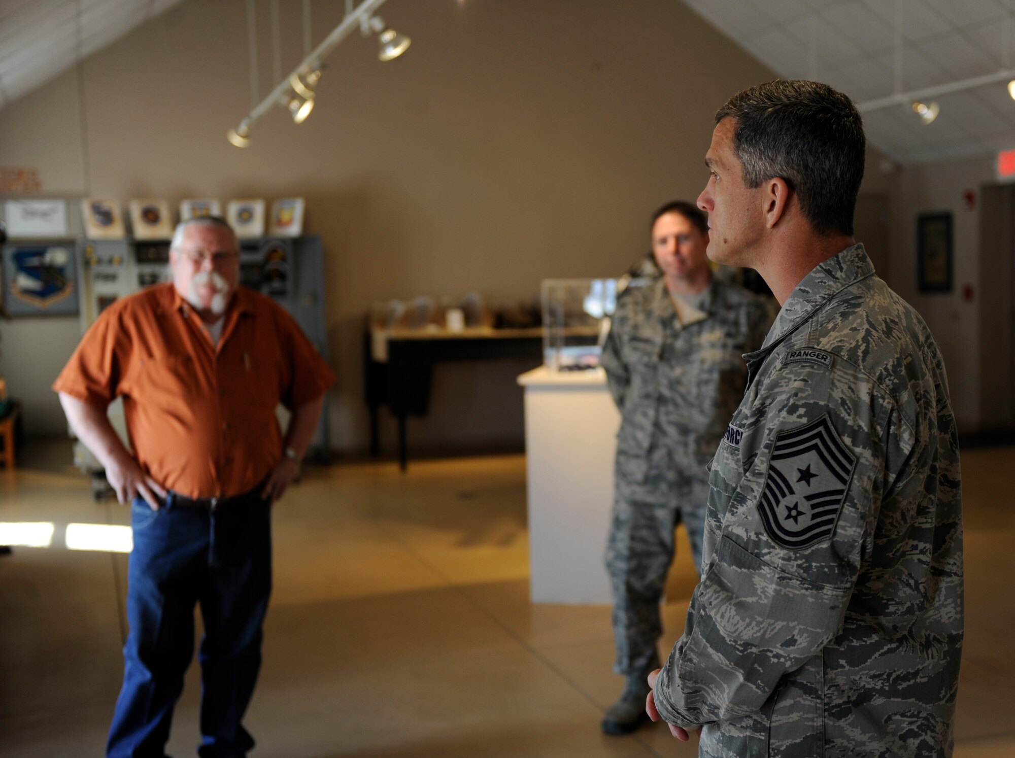 U.S. Air Force Chief Master Sgt. Richard Parsons, right, Air Combat Command command chief, is given a tour of the Dyess museum by Richard “Doc” Warner, left, museum curiator, March 5, 2014, at Dyess Air Force Base, Texas. Parsons was interested in Dyess’ history and expressed how important it is for young Airmen to learn the history of the Air Force. (U.S. Air Force photo by Airman 1st Class Alexander Guerrero/Released)