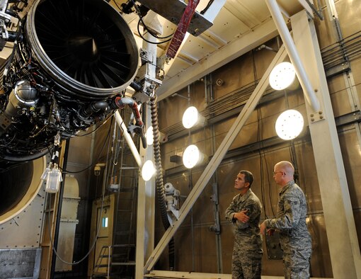 U.S. Air Force Chief Master Sgt. Richard Parsons, left, Air Combat Command command chief, is shown a F-101 engine by Senior Airman Charles Lawrence, 7th Maintenance Group propulsion technician, March 5, 2014, at Dyess Air Force Base, Texas. Lawrence gave the chief in-depth instruction on the engine testing process. (U.S. Air Force photo by Airman 1st Class Alexander Guerrero/Released)