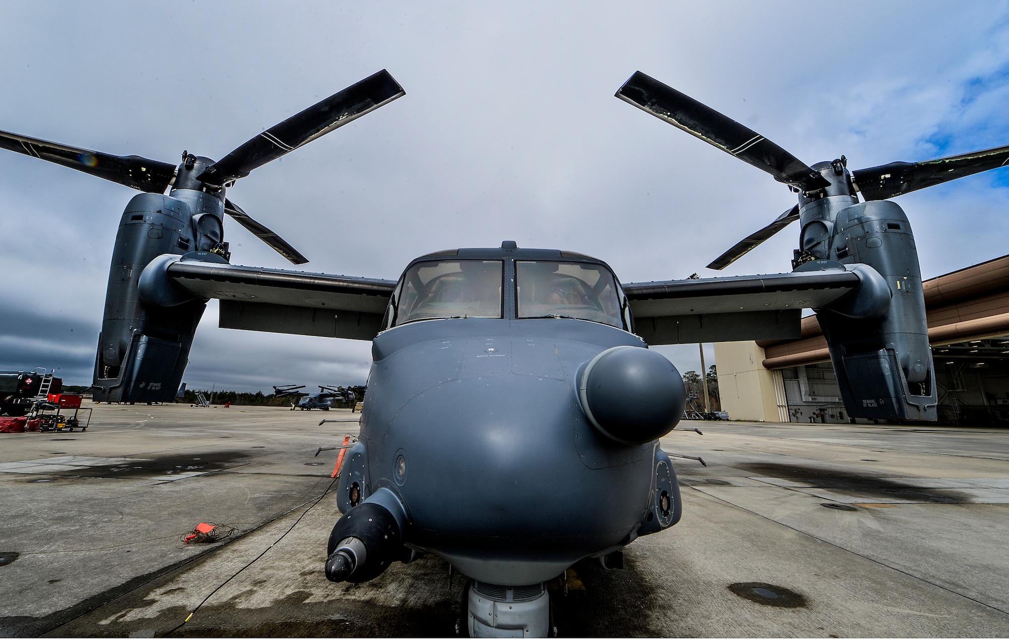 A CV-22 Osprey is parked on the flightline at Hurlburt Field, Fla., March 6, 2014. The CV-22 performs missions normally requiring both fixed-wing and rotary-wing aircraft. (U.S. Air Force photo/Senior Airman Christopher Callaway) 