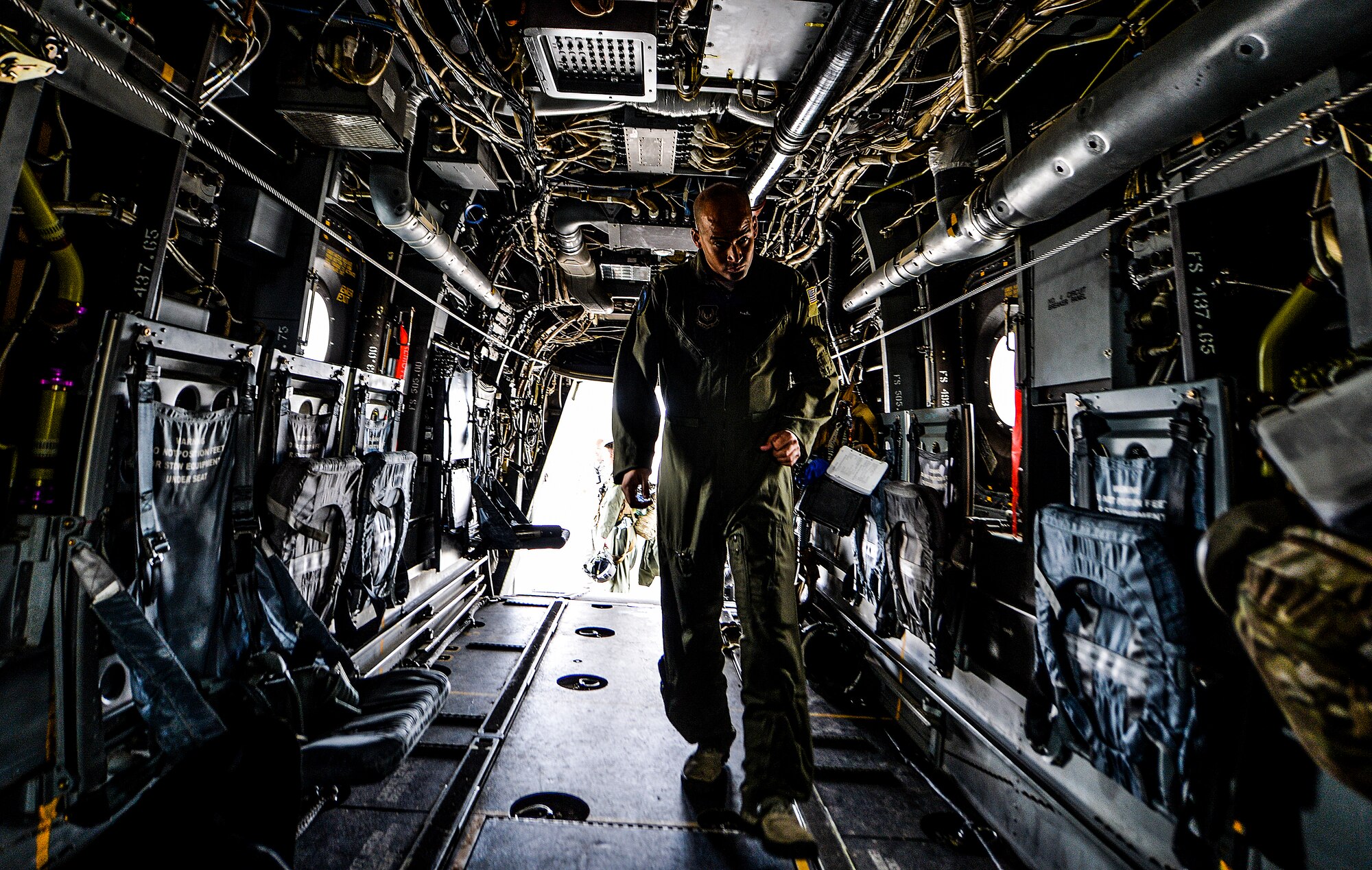 Tech. Sgt. Edilberto Malave, 8th Special Operations Squadron flight engineer, conducts a preflight inspection of a CV-22 Osprey on Hurlburt Field, Fla., March 6, 2014. The 8th SOS is one of the oldest units in the United States Air Force, it was organized as the 8th Aero Squadron on 21 June, 1917 at Kelly Field, Texas. (U.S. Air Force photo/Senior Airman Christopher Callaway) 
