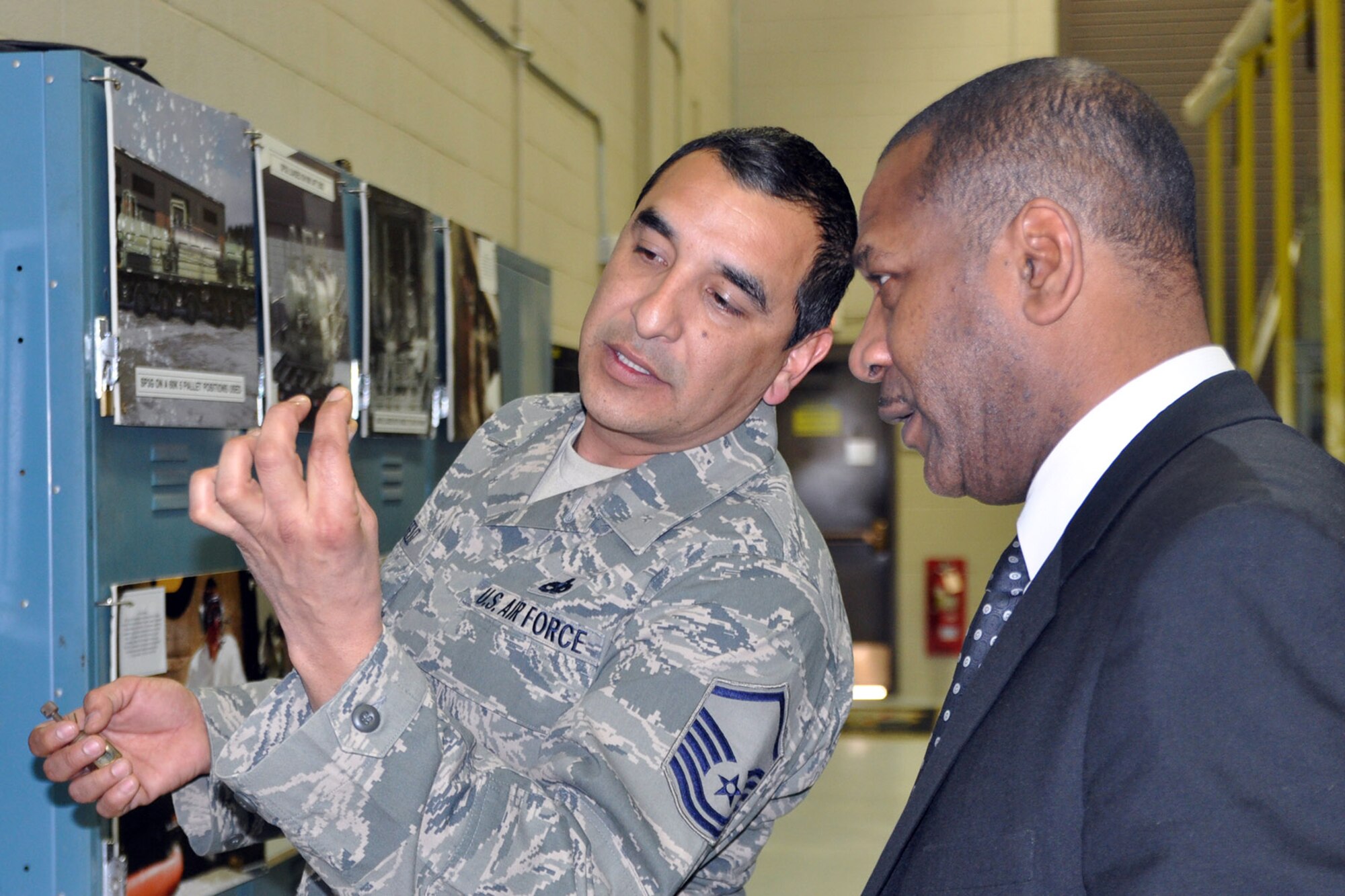 YOUNGSTOWN AIR RESERVE STATION, Ohio – The mayor’s visit to YARS concluded with a guided tour of the 910th Airlift Wing’s one-of-a-kind mission. Air Force Reserve Master Sgt. Stephen Feliz, 910th Aerial Spray Maintenance Specialist, shows nozzles used during the wing’s aerial spray missions to Mayor Doug Franklin (left), of the nearby City of Warren, at the Aerial Spray Facility here during an installation visit, March 7, 2014. The equipment Feliz is holding is part of the Modular Aerial Spray System (MASS). The MASS is used to carry out the unit’s unique capability. The 910th Airlift Wing is home to the Department of Defense’s only aerial spray squadron. The mayor visited YARS to learn more about the wing’s mission and the installation’s features firsthand as well as meet some of the Citizen Airmen assigned here. 