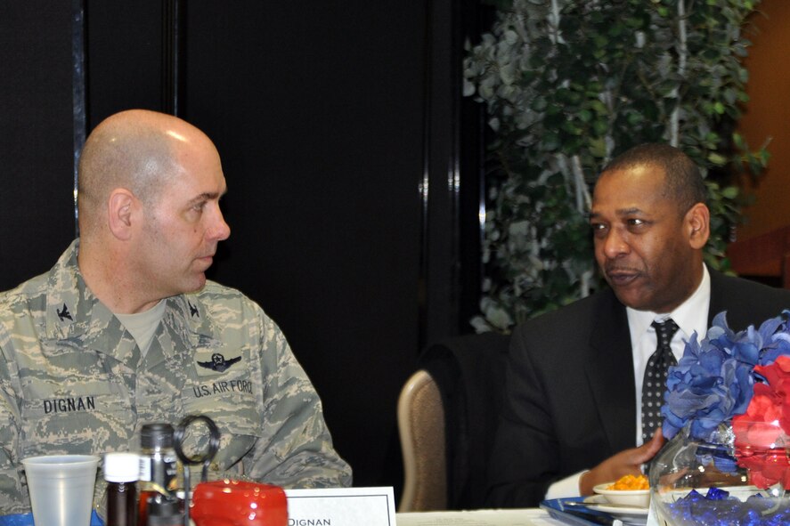 YOUNGSTOWN AIR RESERVE STATION, Ohio – Air Force Reserve Col. James Dignan, commander of the 910th Airlift Wing, talks with Mayor Doug Franklin, of the nearby city of Warren, Ohio, at the Community Activity Center (CAC) during the mayor’s installation visit here, March 7, 2014. Franklin’s tour of YARS started at the CAC for a facility walkthrough and a group meal. The mayor visited YARS to learn more about the wing’s capabilities and the installation’s features firsthand as well as meet some of the Citizen Airmen assigned here.