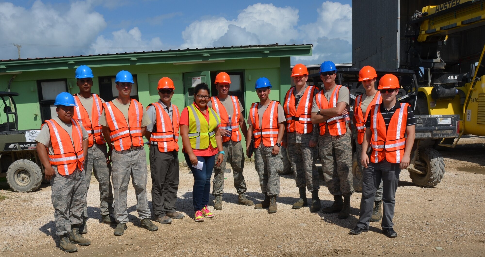 The New Horizons Port Operations team end a 10-hour day after off-loading more than 23 vehicles and 42 shipping containers from the barge at the Port of Belize, March 8. The shipment, which left Cape Canaveral, Fla., March 1, included various construction and maintenance vehicles (tractor trailers, dump trucks, excavators, pickups, forklifts, backhoes and gas trucks) and a variety of shipping containers that will be used to support exercise requirements.