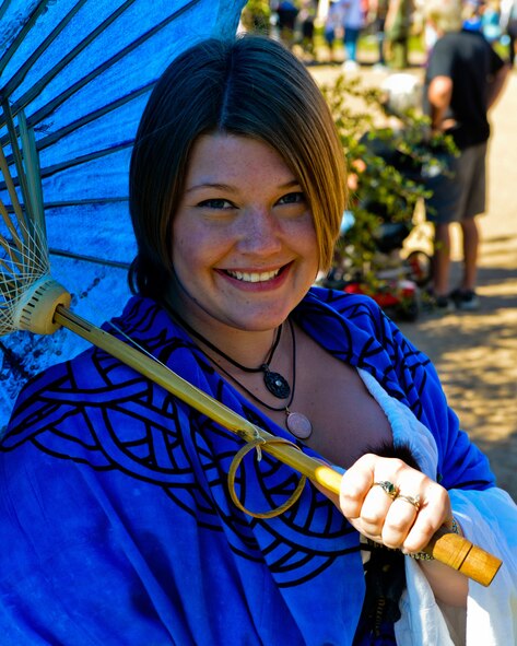 Carissa Latham, wife of Senior Airman Jeffrey Latham II, 607th Air Control Squadron radio frequency transmission journeyman, poses for a photo while sheltering from the sun at the Arizona Renaissance Festival in Apache Junction, Mar 10, 2013. (U.S. Air Force photo/Senior Airman Jason Colbert)
