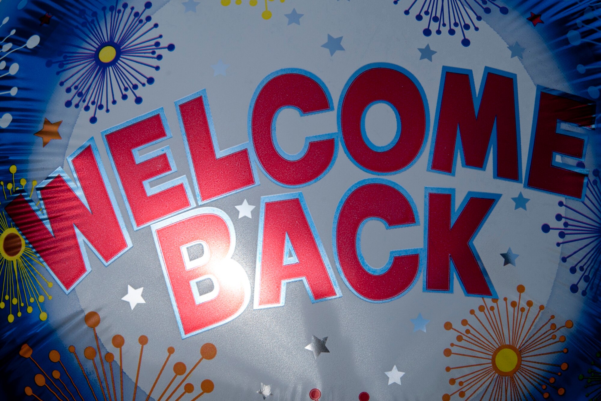 Family, friends and co-workers welcome home group of Airmen from the 2nd and 307th Bomb Wings at Barksdale Air Force Base, La., March 7, 2014. Approximately 280 Airmen from Barksdale deployed to Andersen Air Force Base, Guam, for six months in support of the Air Force's Continuous Bomber Presence in the South China Sea. (U.S. Air Force photo by Master Sgt. Jeff Walston/Released)  