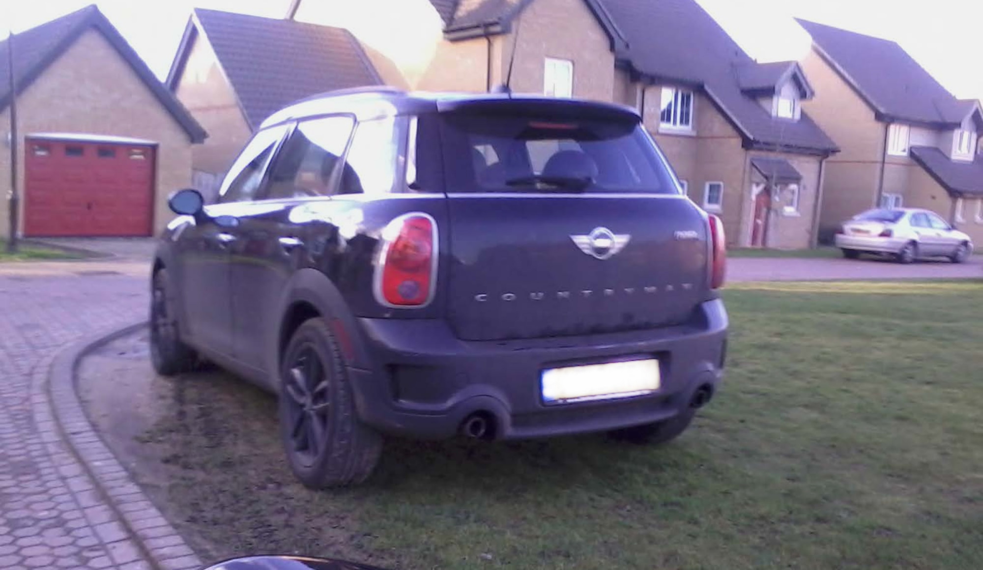 A vehicle is illegally parked on the grass in Liberty Village at Royal Air Force Lakenheath, England.  Parking in non-designated spaces assigned by the housing office, is a violation of 48th Security Forces Squadron and housing office regulations and can result in a suspension of driving priveleges. (Courtesy photo/Released)