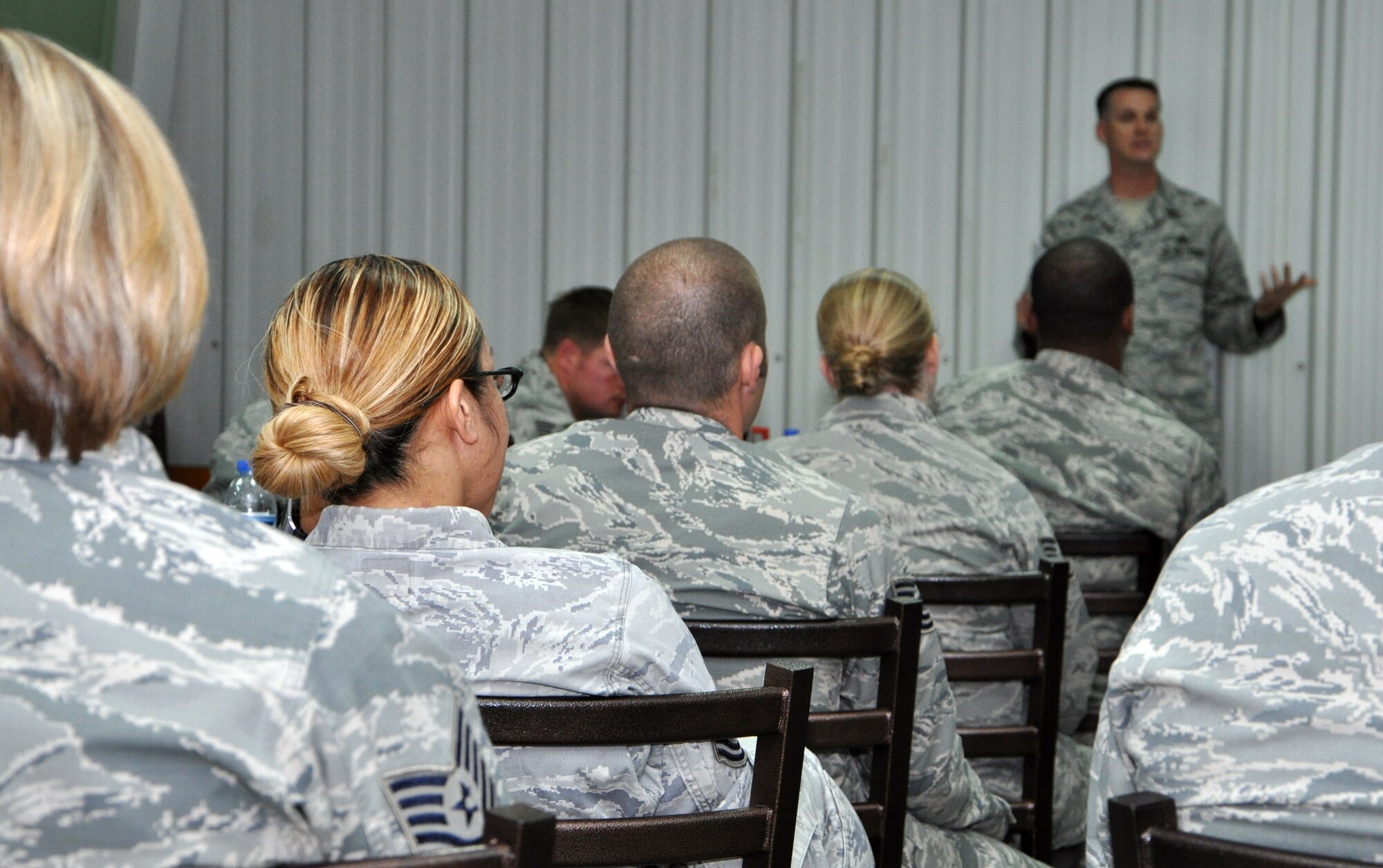 Air Force Master Sgt. Shawn Tolar briefs Airmen during the Additional Duty First Sergeant Symposium here March 5, 2014. He is deployed to the 380th Expeditionary Force Support Squadron as the first sergeant. (U.S. Air Force photo by Master Sgt. April Lapetoda/Released)