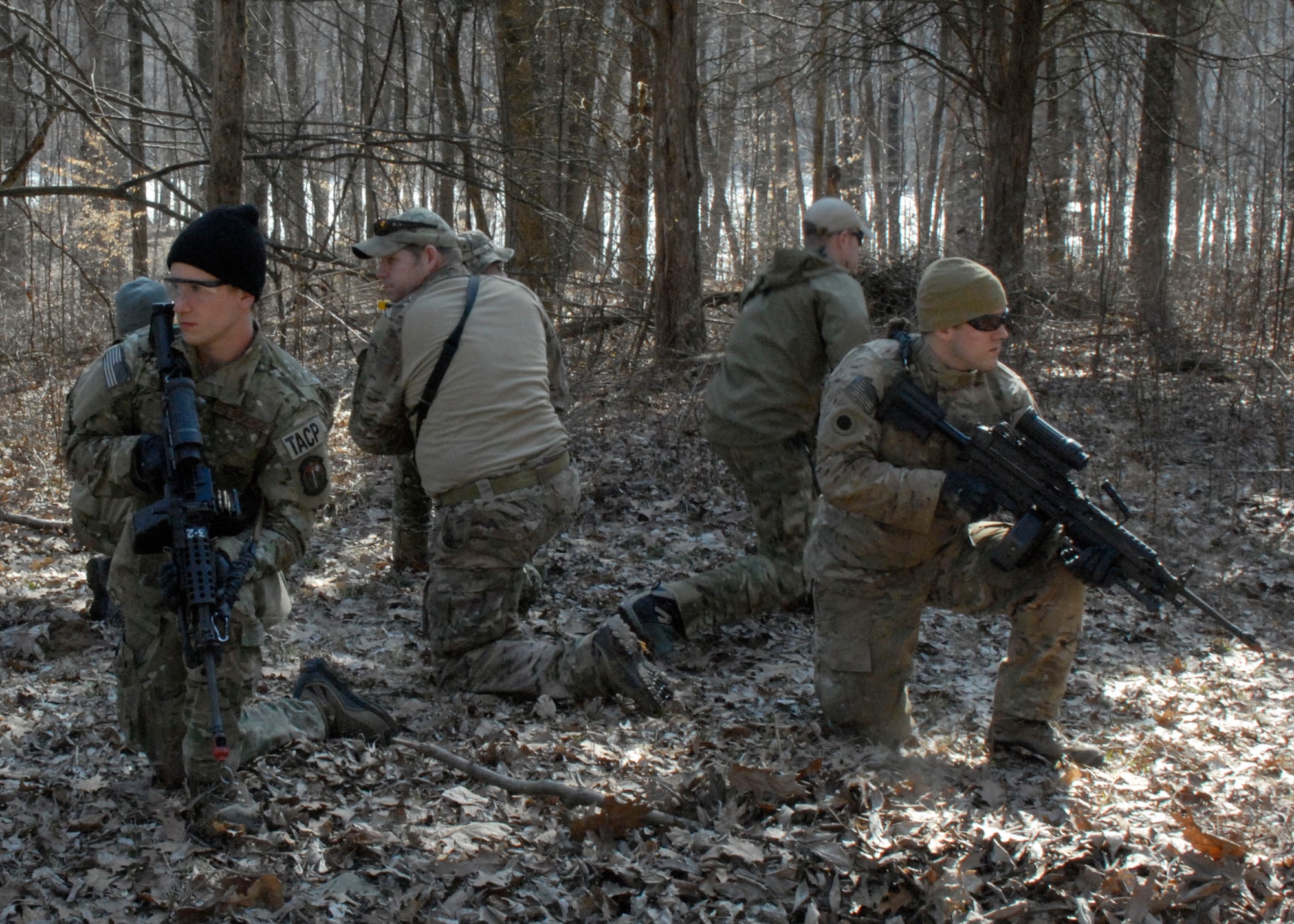 U.S. Air Force airmen from the 181st Intelligence Wing, 113th Air Support operations Squadron, Indiana Air National Guard rehearse patrol maneuvers March 1st during Operation Rogue Banshee at Muscatatuck urban Training Center in Butlerville, Ind. The focus of the joint training was Close Air Support incorporation into urban combat operations and other small unit scenarios. (U.S. Air National Guard photo by Airman 1st Class Joe Boals/Released)
