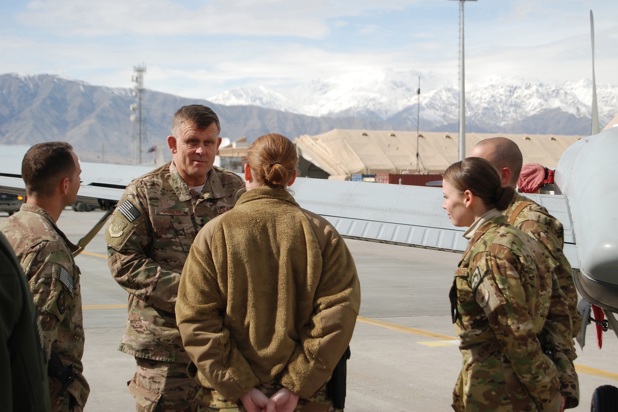 U.S. Air Force Gen. Frank Gorenc, NATO Allied Air Command and U.S. Air Forces in Europe-Air Forces Africa commander, talks with a MC-12W Liberty crew during a visit to Bagram Airfield, March 10, 2014. During the visit, Gorenc had lunch with company grade officers, received a tour of the MC-12W squadron and met with 455th Air Expeditionary Wing leadership. (U.S. Air Force photo by Capt. Brian Wagner/Released)