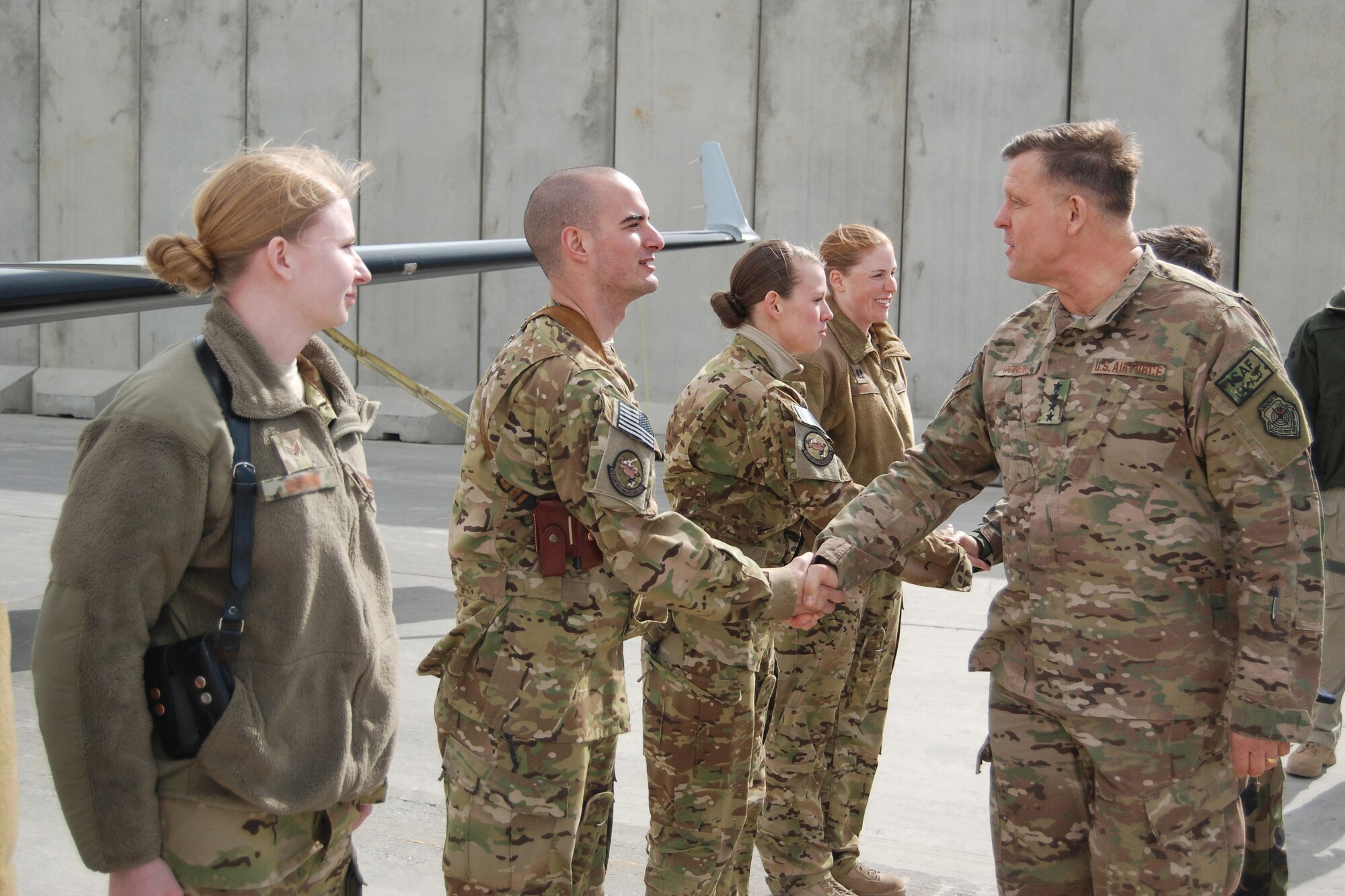U.S. Air Force Gen. Frank Gorenc, NATO Allied Air Command and U.S. Air Forces in Europe-Air Forces Africa commander meets a MC-12W Liberty crew during a visit to Bagram Airfield, March 10, 2014. During the visit, Gorenc had lunch with company grade officers, received a tour of the MC-12W squadron and met with 455th Air Expeditionary Wing leadership. (U.S. Air Force photo by Capt. Brian Wagner/Released) (Some last names blurred on photo for operational security.)
