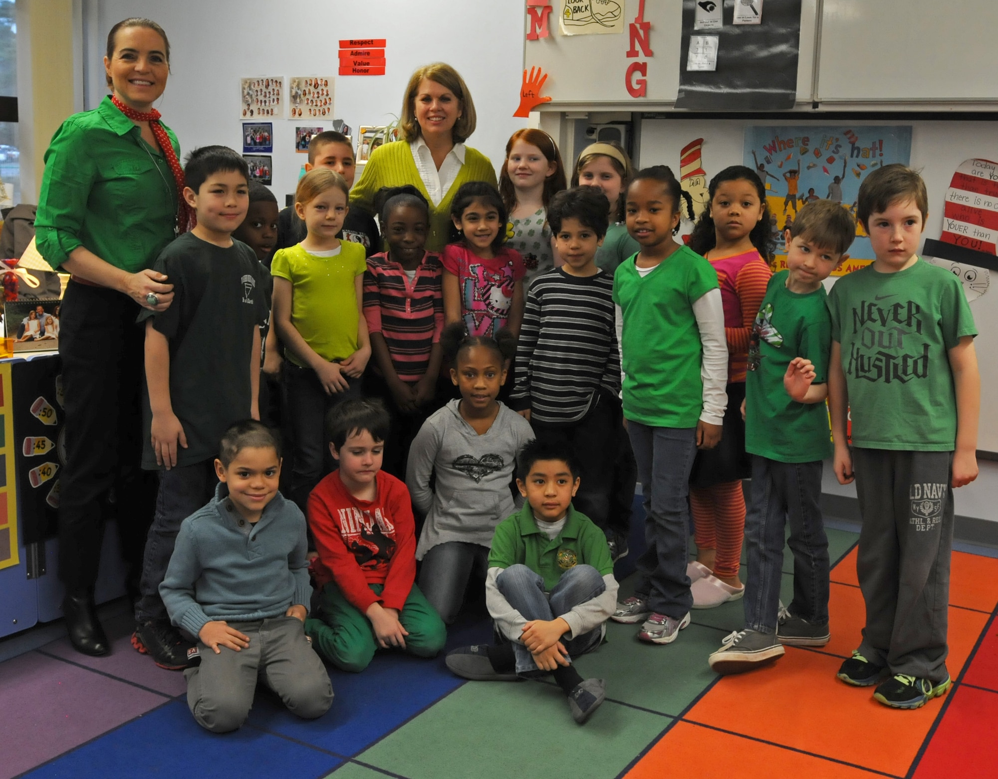 Sharon Gorenc, wife of Gen. Frank Gorenc, U.S. Air Forces in Europe and Air Forces Africa commander, reads to children from Cheryl Woodruf’s second grade class to help kick off Read Across America at Ramstein Elementary School, Mar. 3, 2014, Ramstein Air Base, Germany. Read Across America is a week-long celebration, held the week of Dr. Seuss’ birthday, to teach children the importance of reading and education in schools across America and U.S. military installations overseas. (U.S. Air Force photo/Airman 1st Class Holly Mansfield)