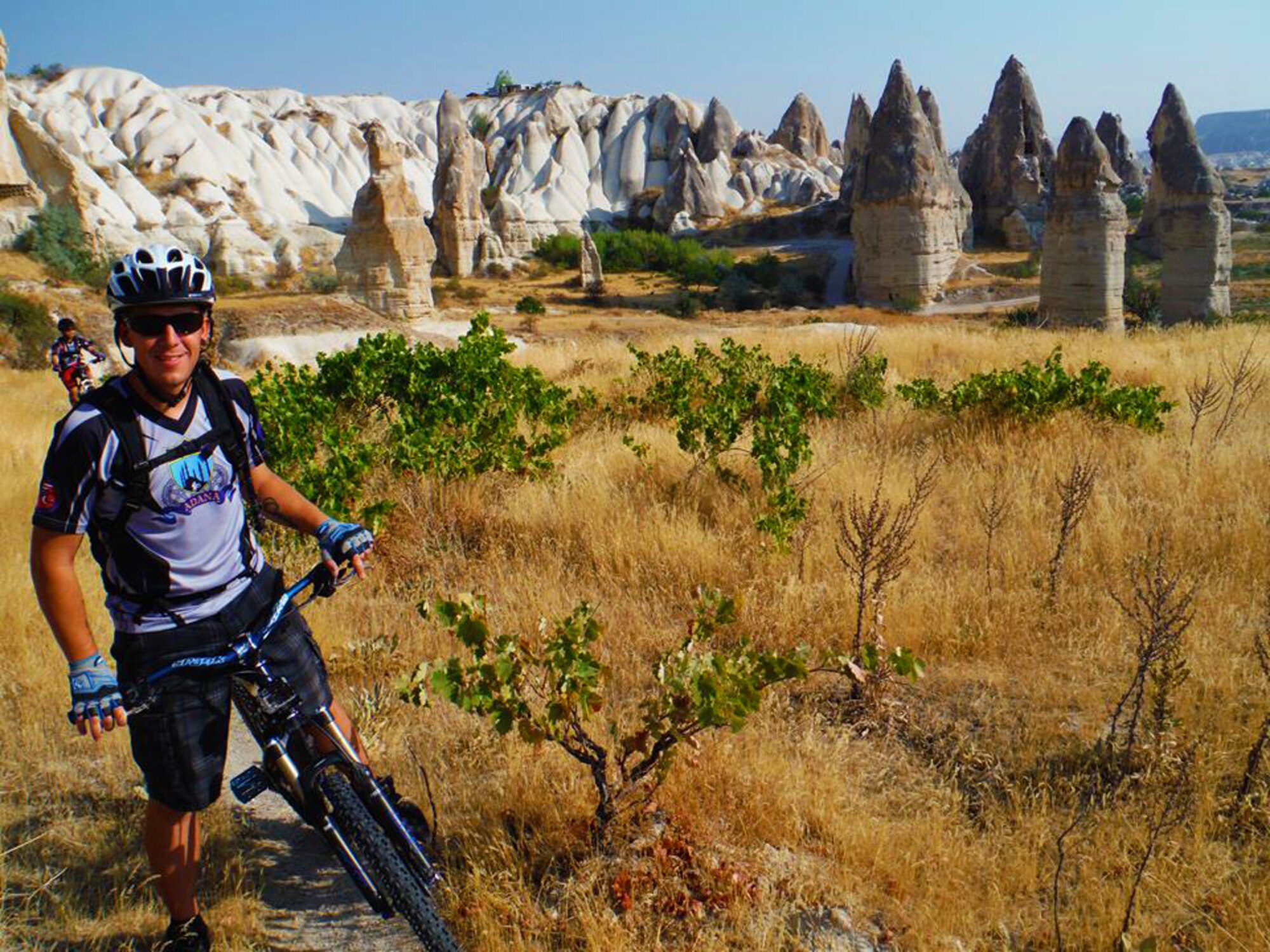 Master Sgt. Chris Rekrut, 728th Air Mobility Squadron Quality Assurance superintendent, pauses during a mountain bike ride near Goreme, Turkey, also known as the region of Cappadocia, in the summer of 2013. Rekrut, who was recently promoted by means of the Stripes for Exceptional Performers program, was actively involved with the Turkey chapter of the Beer Belly Bike Club and played a large role in planning trips such as this one for the group. (Courtesy photo)
