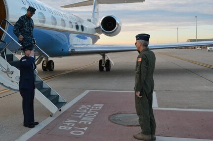 SCOTT AIR FORCE BASE, Ill. (March 11, 2014) - Adm. Cecil D. Haney, Commander, United States Strategic Command (USSTRATCOM), is greeted by Lt. Gen. Bash, Air Mobility Command vice commander, upon Haney's arrival to Scott Air Force Base. The visit allowed Air Mobility Command and 18th Air Force leaders to discuss more effective ways to carry out the commands' global missions. USSTRATCOM  relies on various components for the execution of its global missions, including space operations, information operations, missile defense, global command and control; intelligence, surveillance and reconnaissance (ISR); global strike and strategic deterrence, and combating weapons of mass destruction. The 18th Air Force supports USSTRATCOM's mission by providing aerial refueling capabilities through Task Force 294. (U.S. Air Force photo/Released)