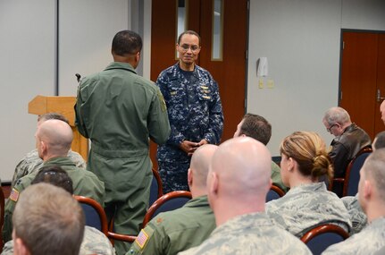 SCOTT AIR FORCE BASE, Ill. (March 11, 2014) Adm. Cecil D. Haney, Commander, U.S. Strategic Command (USSTRATCOM), listens to a question from an Airman of the 126th Air Refueling Wing (ARW) during his visit to Scott Air Force Base. USSTRATCOM relies on various task forces for the execution of its global missions, including space operations, information operations, missile defense, global command and control; intelligence, surveillance and reconnaissance (ISR); global strike and strategic deterrence, and combatting weapons of mass destruction. The 126 ARW, assigned to the Illinois Air National Guard, support's USSTRATCOM's global strike and strategic deterrence missions through aerial refueling with the KC-135R Stratotanker to deter regional and strategic threats from adversaries with ground warfare capabilities. (U.S. Air National Guard photo by Master Sgt. Ken Stephens/Released)