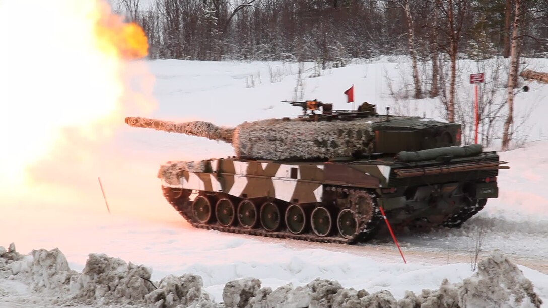 Norwegian tanks take part in a live-fire capabilities demonstration during Cold Response 14, a multinational and multilateral training exercise above the Arctic Circle that brings together more than 14,000 servicemembers from 15 different countries, to include approximately 1,200 NATO personnel, March 11. The Norwegian-led exercise involves maritime, land and air operations being conducted this month to rehearse high-intensity operations in unique winter conditions, showcasing the diplomatic relationships, strategic friendships, and commitment to global security interests of all participating nations. The majority of the servicemembers are participating from the United States, Norway, Canada, France, the Netherlands, Great Britain and Sweden.