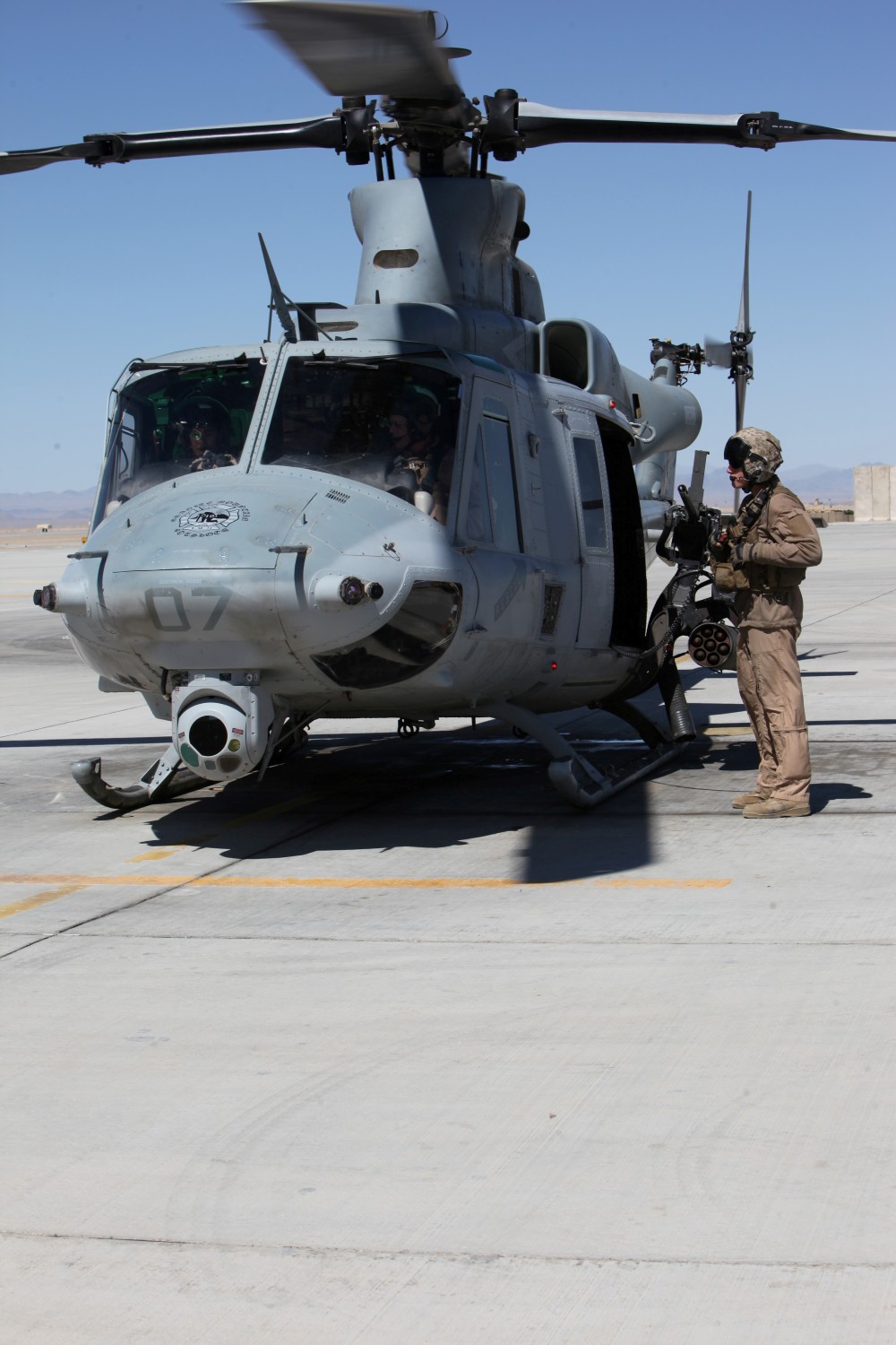 Brigadier Gen. Mark R. Wise, assistant wing commander, 3rd Marine Aircraft Wing, begins start-up procedures in a UH-1Y Huey, for a mission with Marine Light Attack Helicopter Squadron 369, March 10, 2014. Brigadier Gen. Wise traveled from Marine Corps Air Station Miramar, Calif., to visit the air wing Marines deployed to Regional Command (Southwest) in Helmand province, Afghanistan.