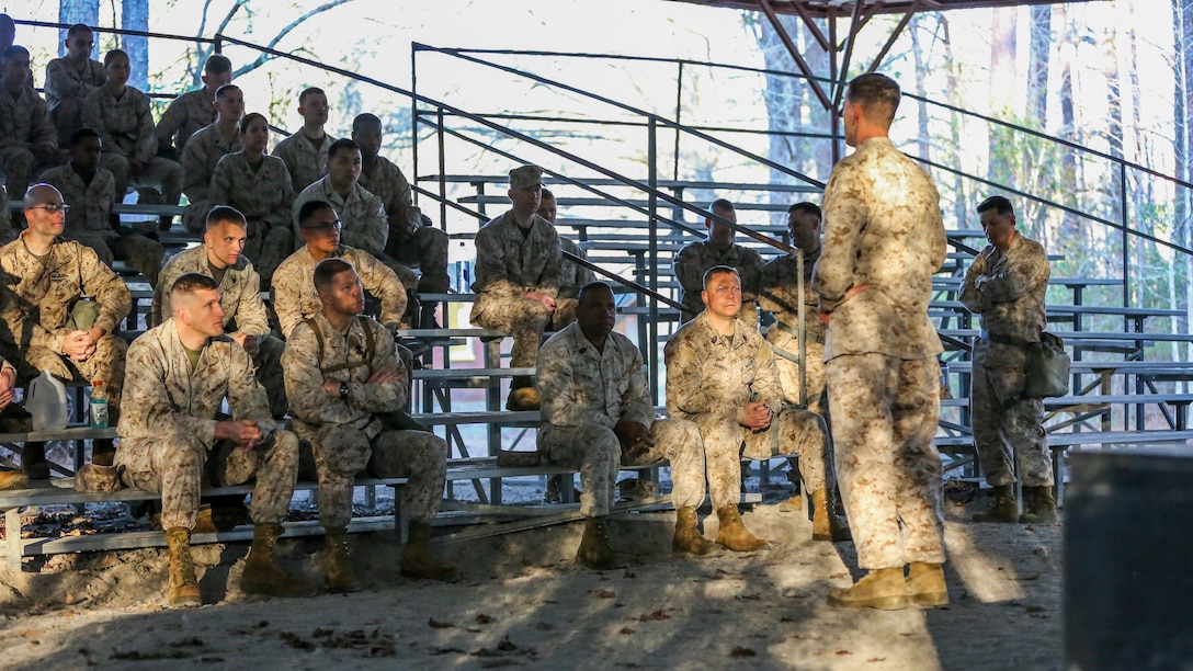 U.S. Marines assigned to the 26th Marine Expeditionary Unit (MEU) command element (CE) are given a class on chemical biological radiological and nuclear (CBRN) defense aboard Camp Lejeune, N.C., March 11, 2014. The training consisted of classroom instruction and an obstacle course to familiarize Marines with CBRN defense equipment and procedures. (U.S. Marine Corps photo by Lance Cpl. Joshua W. Brown/Released)