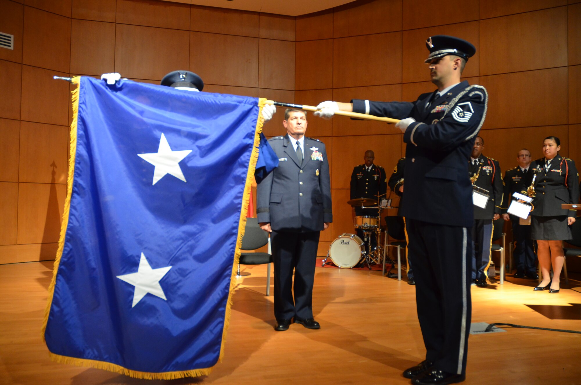 Air Force Color Guard unfurled the two star general officer flag for newly promoted General Officer David Todd Kelly at North Carolina National Guard Joint Force Headquarters on March 7, 2014.  Kelly was promoted to the rank of Air Force Maj. Gen. and will serve as the Air National Guard Assistant to the Commander, Air Mobility Command at Scott Air Force Base, IL.  In this capacity, he will be responsible for advising the commander and staff on all issues impacting the ANG nationally. (U.S. Army National Guard Photo by Sgt Leticia Samuels, North Carolina National Guard Public Affairs/Released)