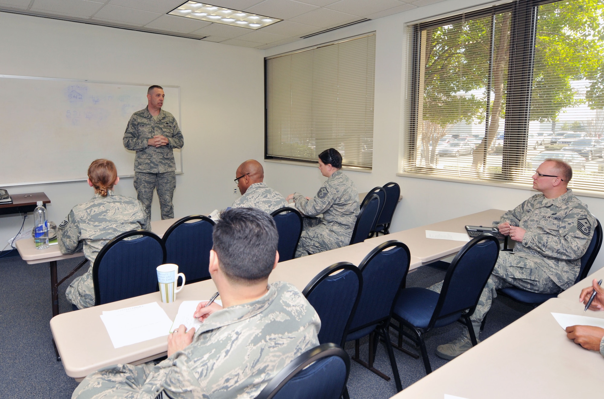 U.S. Air Force Chief Master Sgt. Michael Kennedy, first sergeant Functional Area Manager for the U.S. Air National Guard, speaks interactively with first sergeants from the 145th Airlift Wing, March 9, 2014 at the North Carolina Air National Guard base, Charlotte Douglas Intl. airport. Kennedy discussed expectations, responsibilities and the future for those who have been selected for the position of First Sergeant.  (U.S. Air National Guard photo Master Sgt. Patricia F. Moran, 145th Public Affairs/Released)